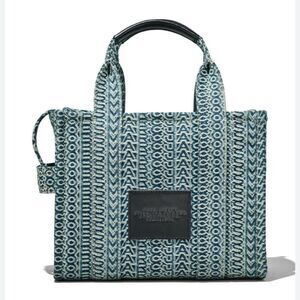 Marc Jacobs Medium Washed Monogram Denim The Tote Bag in the sun faded denim